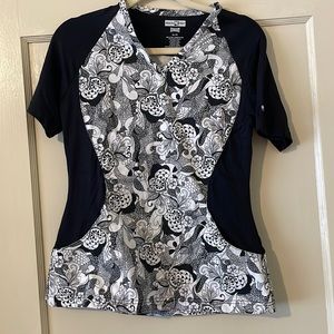 Scrub top. Never worn. Has stretch for comfort. Perfect for healthcare worker.